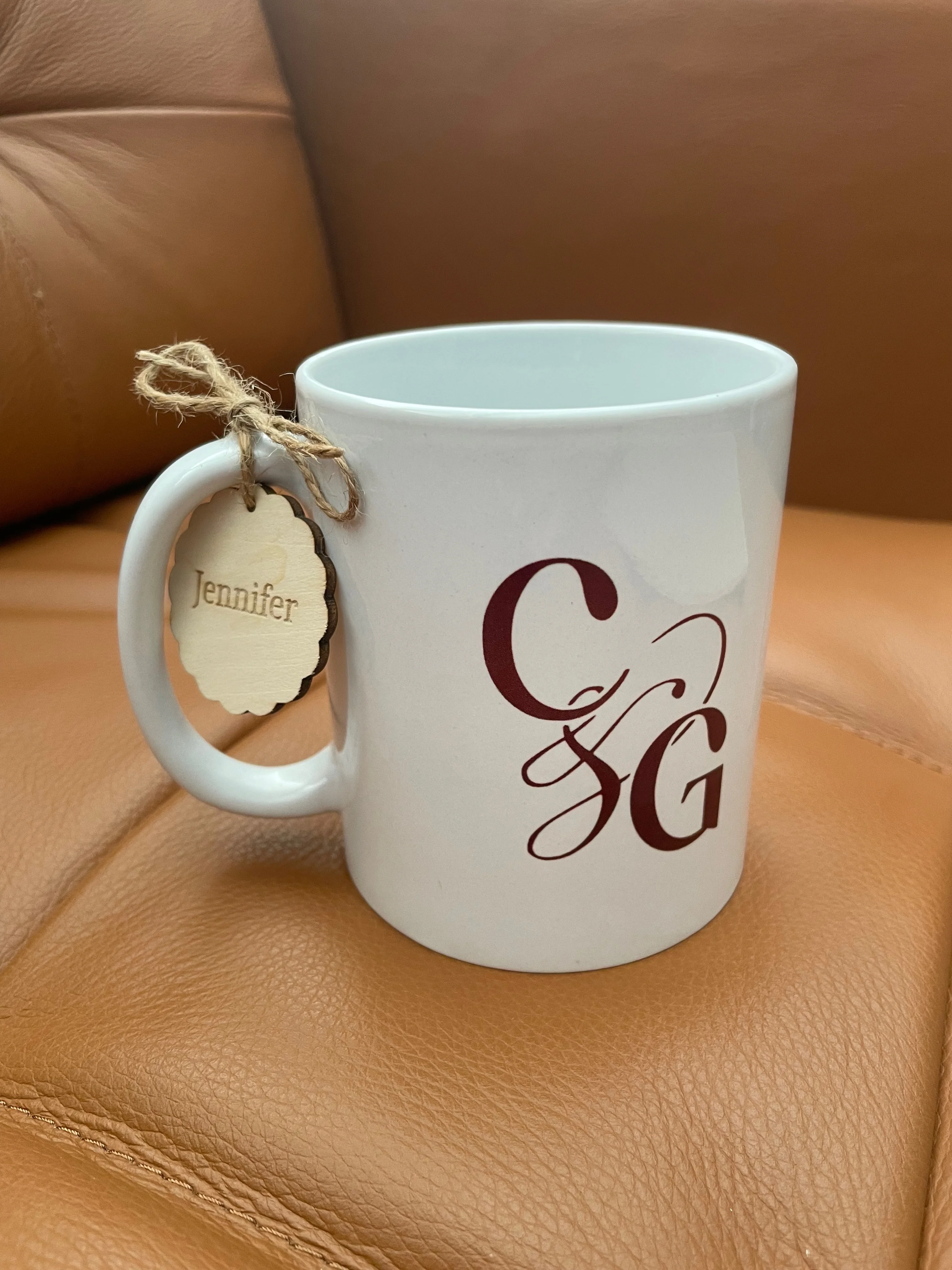 Picture of Coffee Mug Personalized with a Custom Logo and Tag.